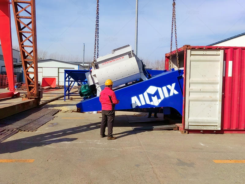 component of mobile concrete batching plants for sale being placed in container for shipment